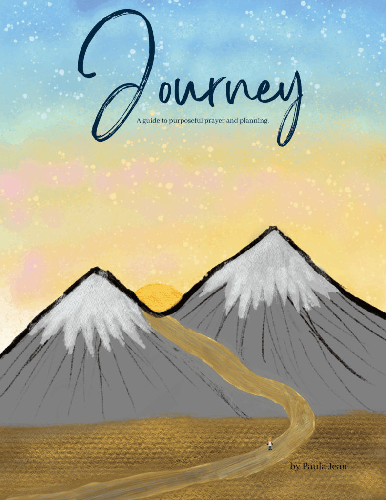 Planner cover of snow capped mountains and a road leading up through the mountain with Journey written at the top over a blue sky.